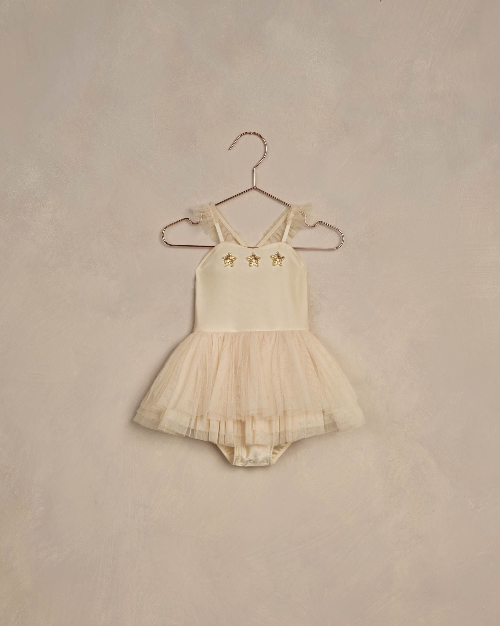 Noralee Laurel sold Tutu in Cloud